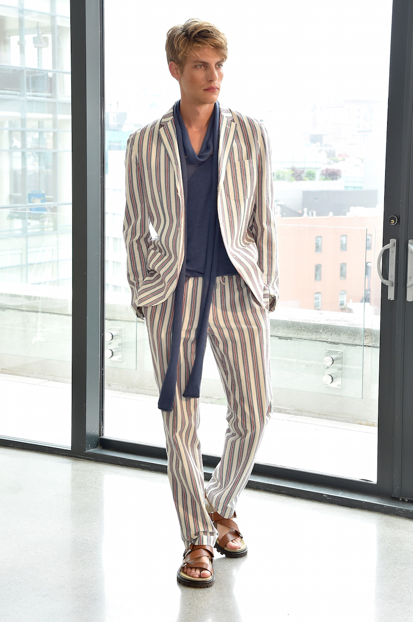 NEW YORK, NY - JULY 15:  A model walks at the Michael Kors Spring 2016 Presentation during New York Fashion Week: Men's at Spring Studios on July 15, 2015 in New York City.  (Photo by Larry Busacca/Getty Images for Michael Kors)