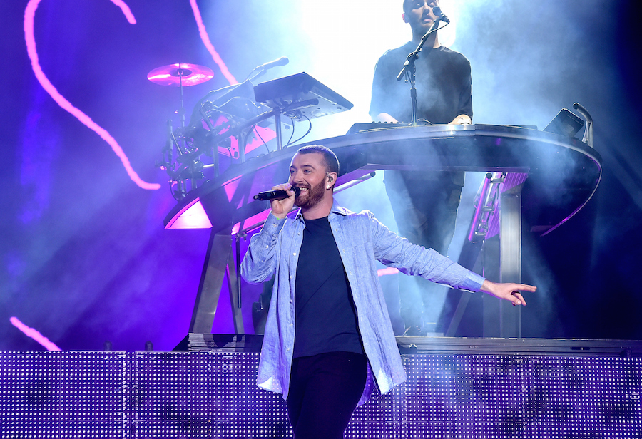 INDIO, CA - APRIL 16: Singer Sam Smith (L) performs with Guy Lawrence (R) of Disclosure during the Disclosure show on day 2 of the 2016 Coachella Valley Music & Arts Festival Weekend 1 at the Empire Polo Club on April 16, 2016 in Indio, California. (Photo by Kevin Winter/Getty Images for Coachella)