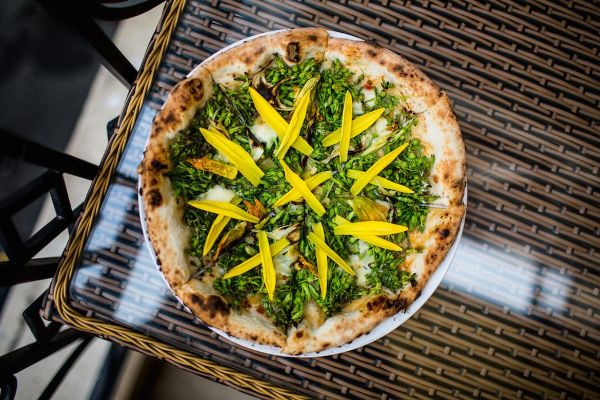 A Four Flowers pizza with homemade Mozzarella and various fresh flowers at Pizza 4Ps in Ho Chi Minh City, Vietnam. // Credit : Aaron Joel Santos for The New York Times